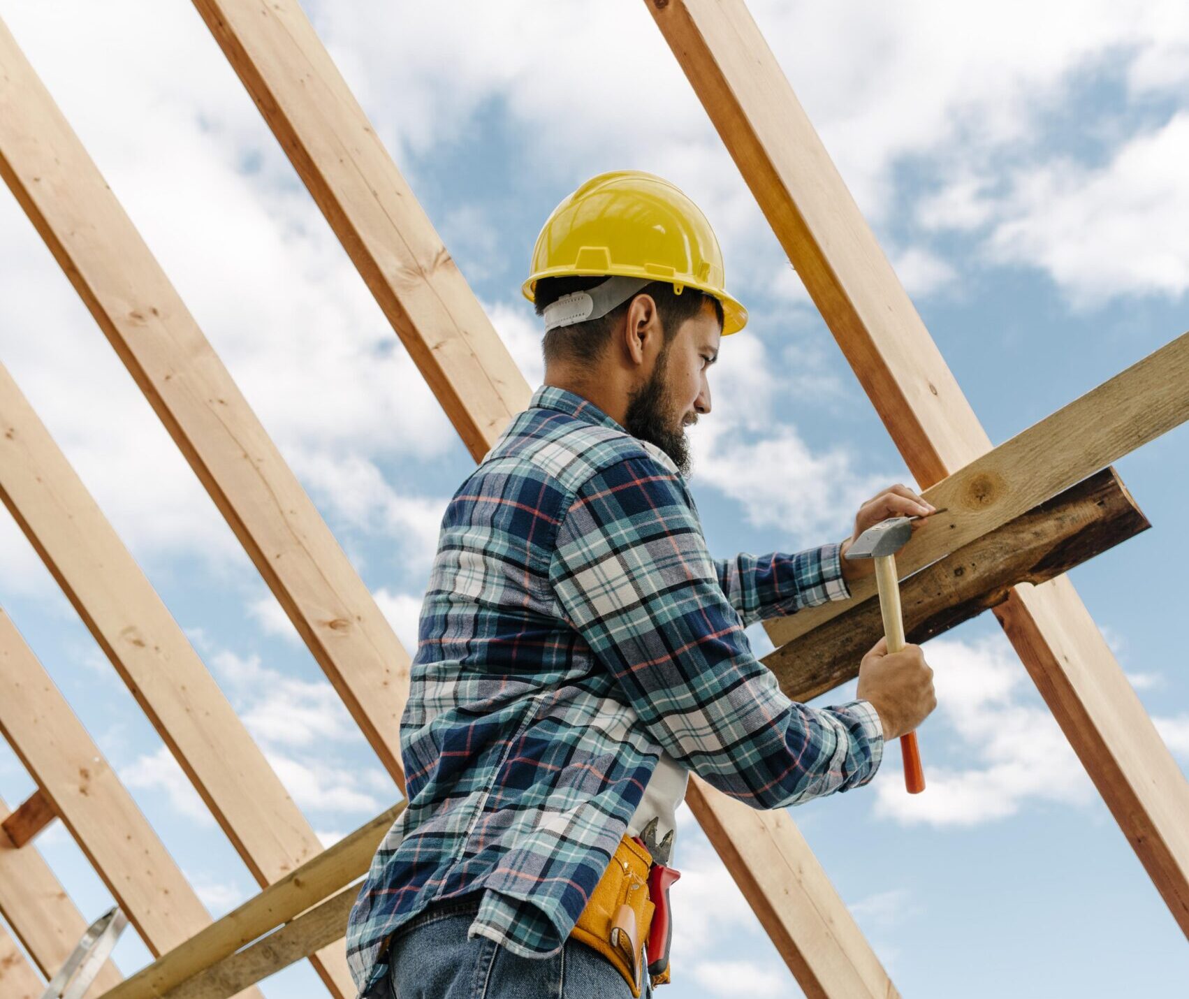 construction-worker-with-hard-hat-building-roof-house