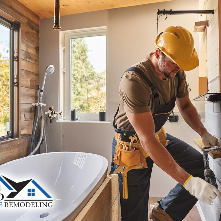 expert bathroom remodeling male professional contractor performing expert residential home remodeling service in bathroom of home