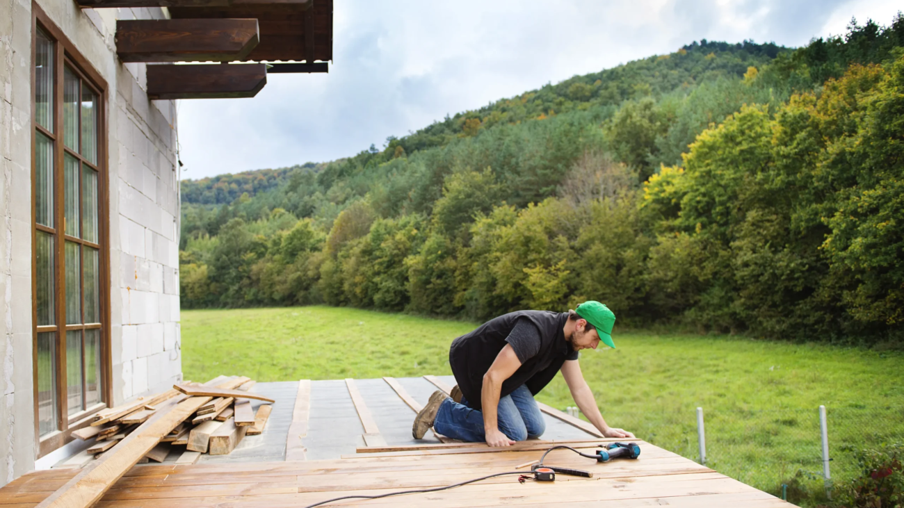 handyman-installing-wooden-flooring-2024-10-18-08-32-33-utc